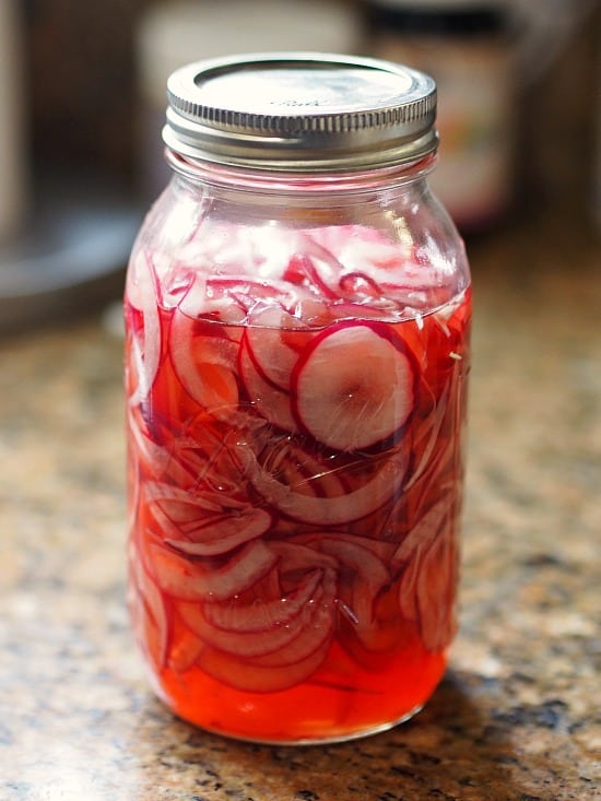 So easy to make and a delicious addition to just about anything! Tacos, sandwiches, nachos, omelets, out of the jar.... On top of pretzels. OMG, I sound like a pregnant woman. LOL! I love pickled onions! Sweet and spicy, Just like me! Ha. 