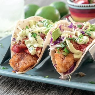 Warm Salsa Fish Tacos with Avocado Cream Sauce