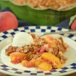 A picture of a plate of Peach Cobbler with Candied Almonds