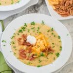 A picture of Roasted Potato Garlic soup with cheese and bacon